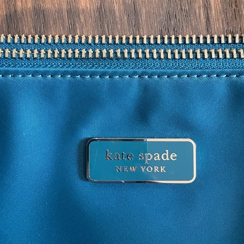 New kate spade teal nylon tote with gold-tone zipper.    Excellent condition.